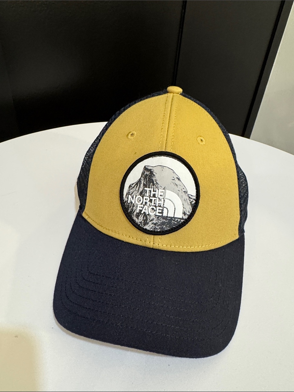 The North Face Mustard Yellow and Navy Logo Trucker Cap